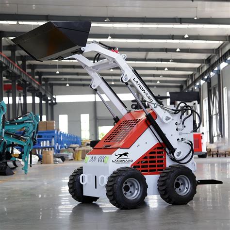 skid steer use in an orchard|skid steer on a farm.